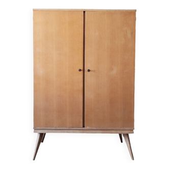 Wooden wardrobe with compass legs