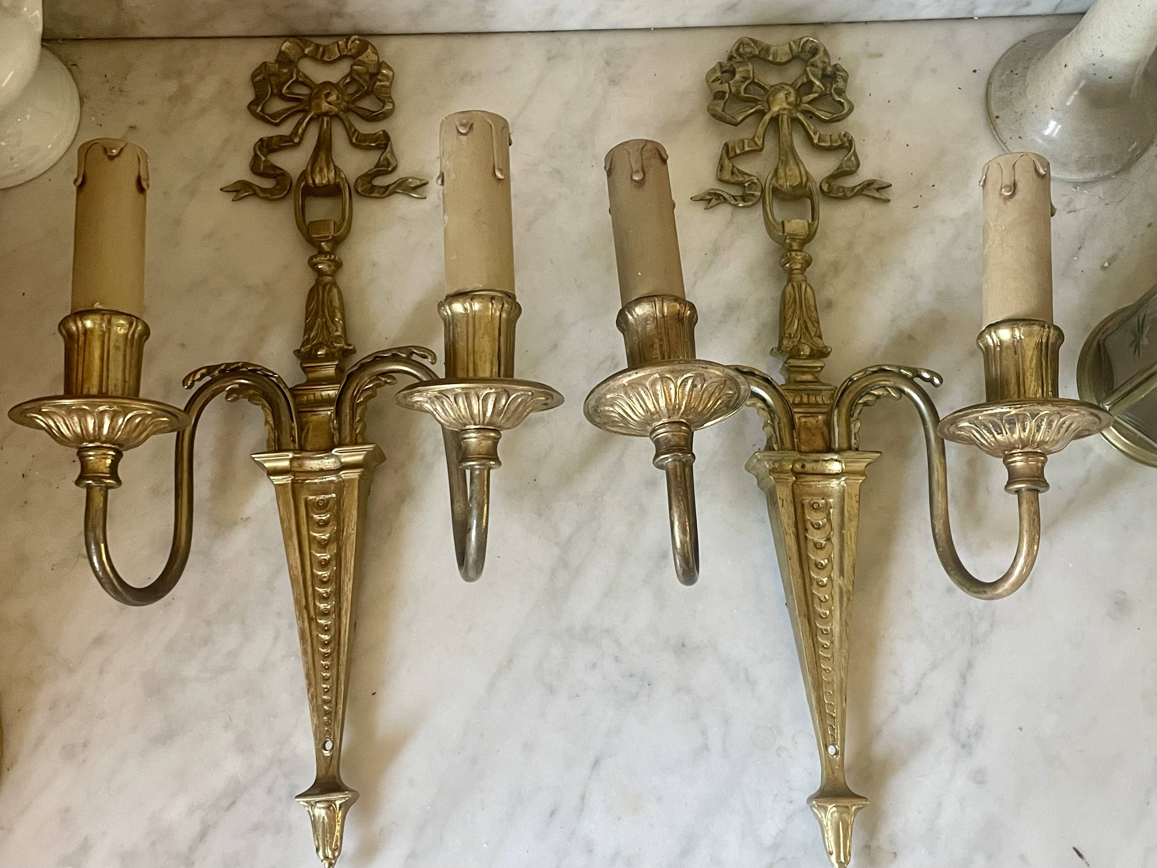 Pair of wall lights in brass and gilded bronze, Arnold Montrose Ltd, Lo