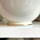 Pillivuyt white and gold porcelain eared salad bowl, "Eva" service