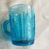 Old turquoise glass cup