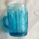 Old turquoise glass cup