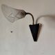 1950s wall lamp, metal, flexible brass stem and opaque shade.