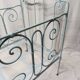 Old children's bed with metal bars