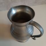Tin pitcher with handle and spout