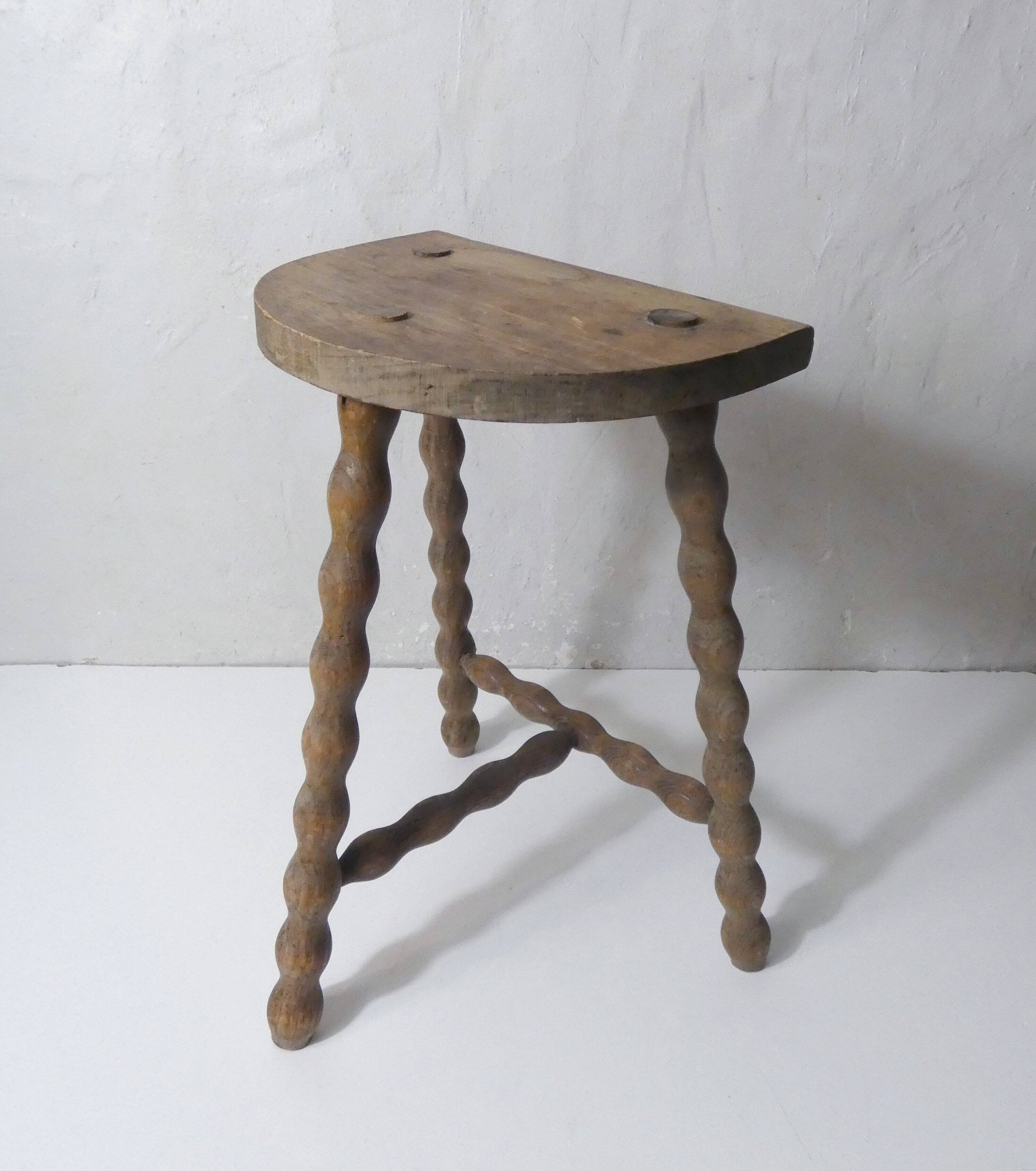 vintage half-moon tripod stool in turned solid wood with beaded edges