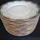 12 Art Deco dinner plates in Limoges porcelain decorated by Jean Boyer, 1920