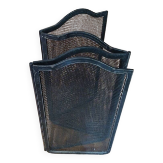 Metal fireplace screen made up of 4 leaves
