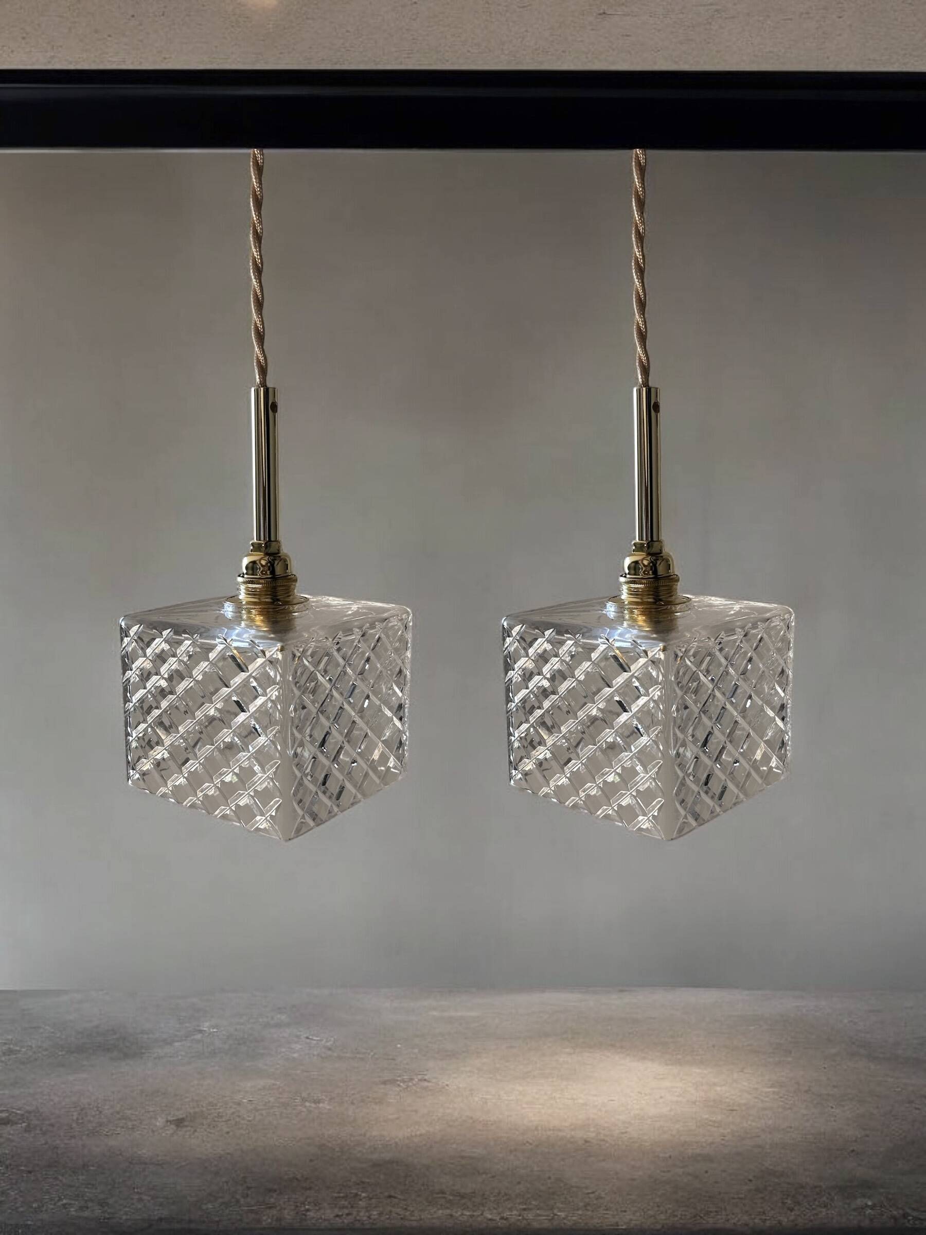 Pair of chiseled glass portable lamps