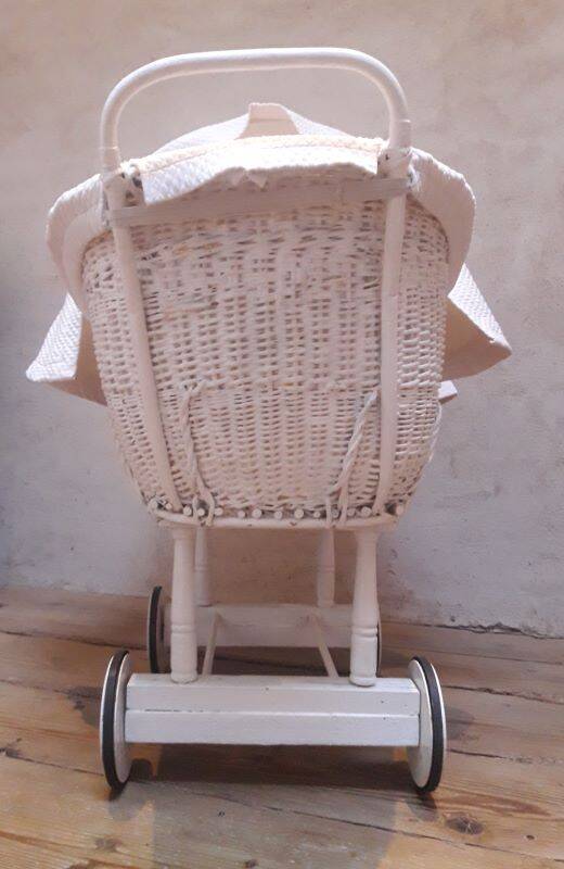 Wicker and painted wood baby cradle