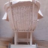 Wicker and painted wood baby cradle