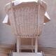 Wicker and painted wood baby cradle