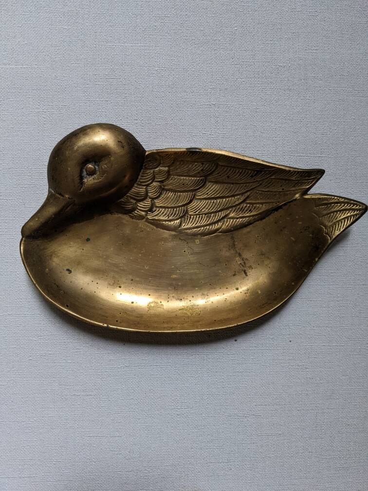 Brass duck emptier, country decorative object