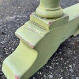 Old table with patinated green legs