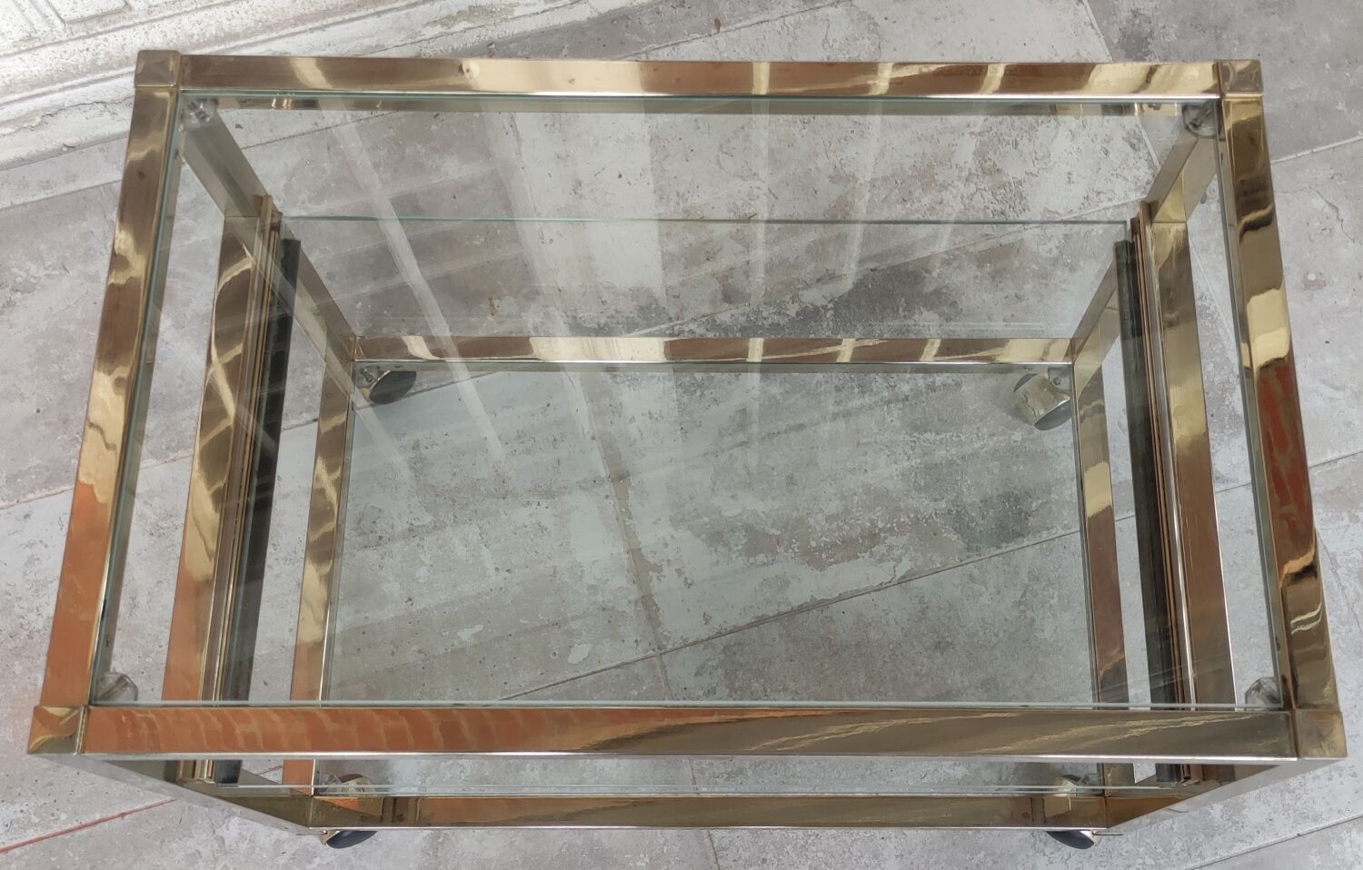 Rolling console service design / gold metal and glass