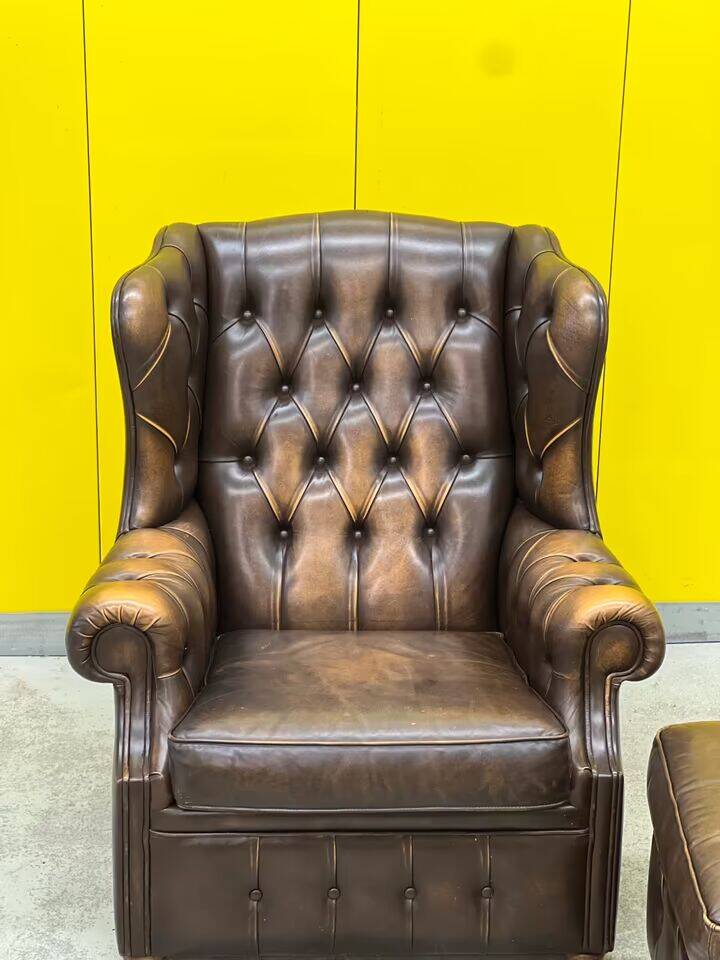 Brown leather chesterfield wing chair with Ottoman