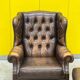 Brown leather chesterfield wing chair with Ottoman