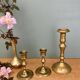 Set of 3 antique brass candle holders/candelabra.