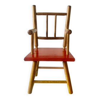 Old wooden chair for doll