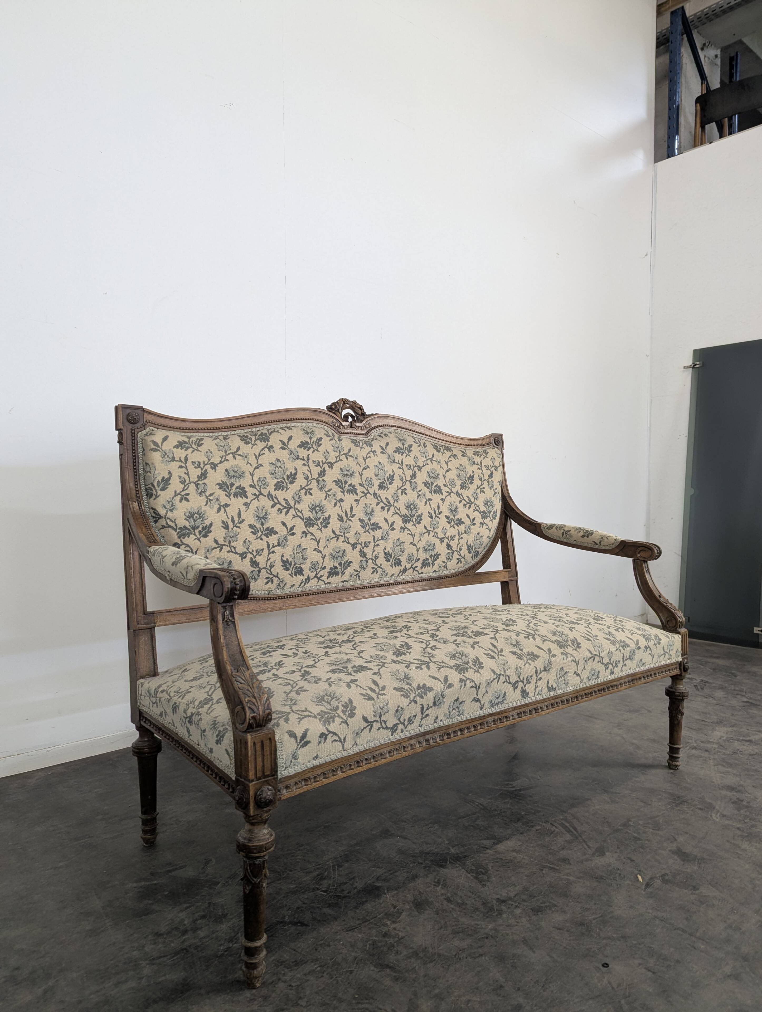 Louis XVI style salon with shield backrest from the 19th century.