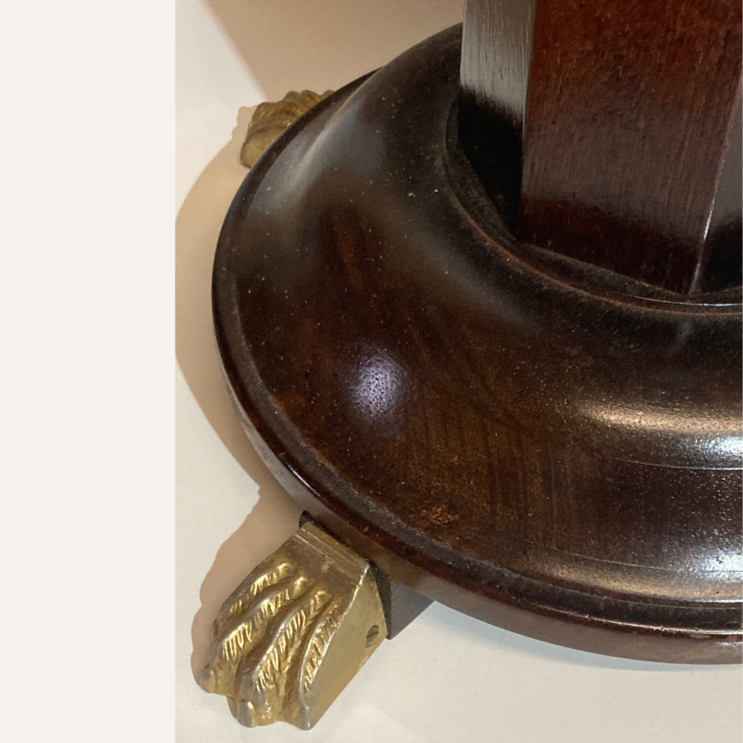 Vintage mahogany pedestal or side table with brass claw feet