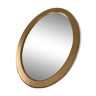 Golden oval mirror