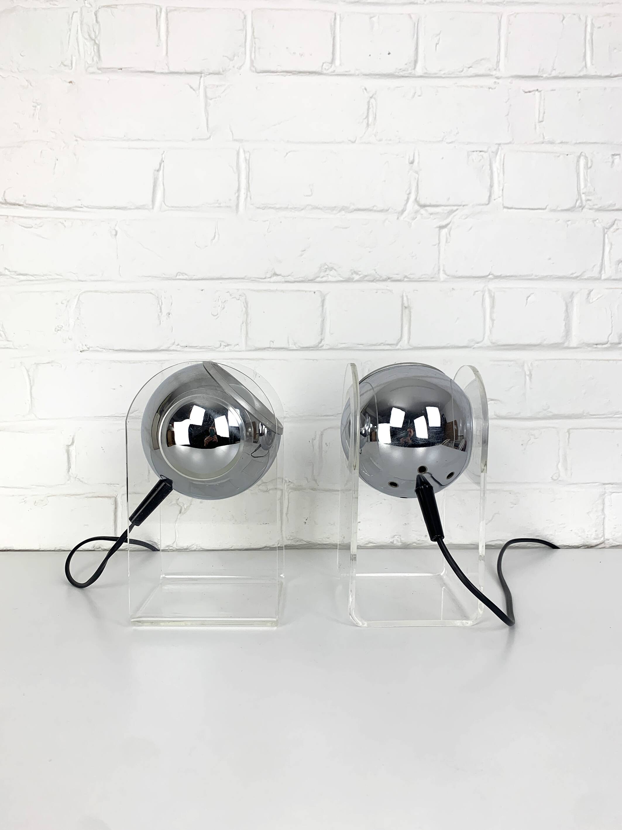Pair of space age chrome plexiglass sphere table lamps from the 70s