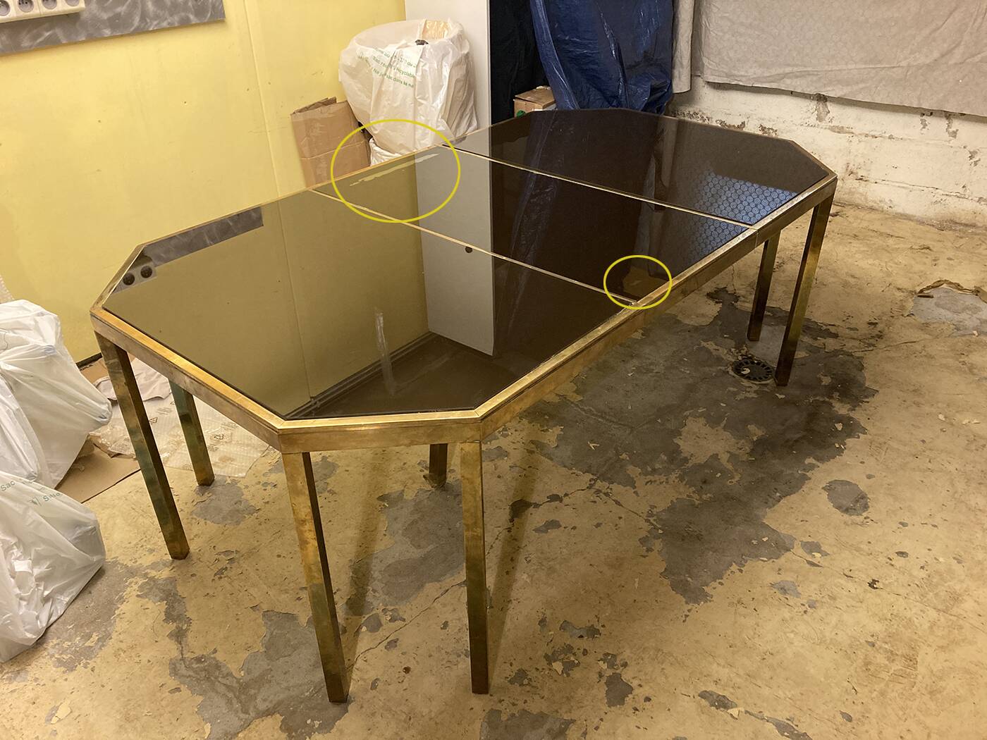 Coffee table in solid brass and black opaline. 1970