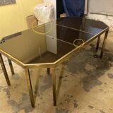 Coffee table in solid brass and black opaline. 1970