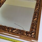 Patinated golden rectangular mirror, decorated with acanthus leaves, 49 cm