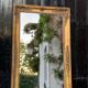 Miroir Empire en bois stuqué et doré, début XIXème siècle