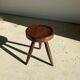 Brown solid wood stool seated circular dug