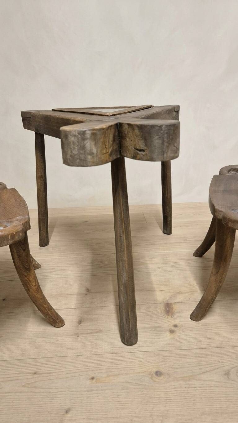 Vintage sculptural wooden table and two chairs, hand-carved loop backrests