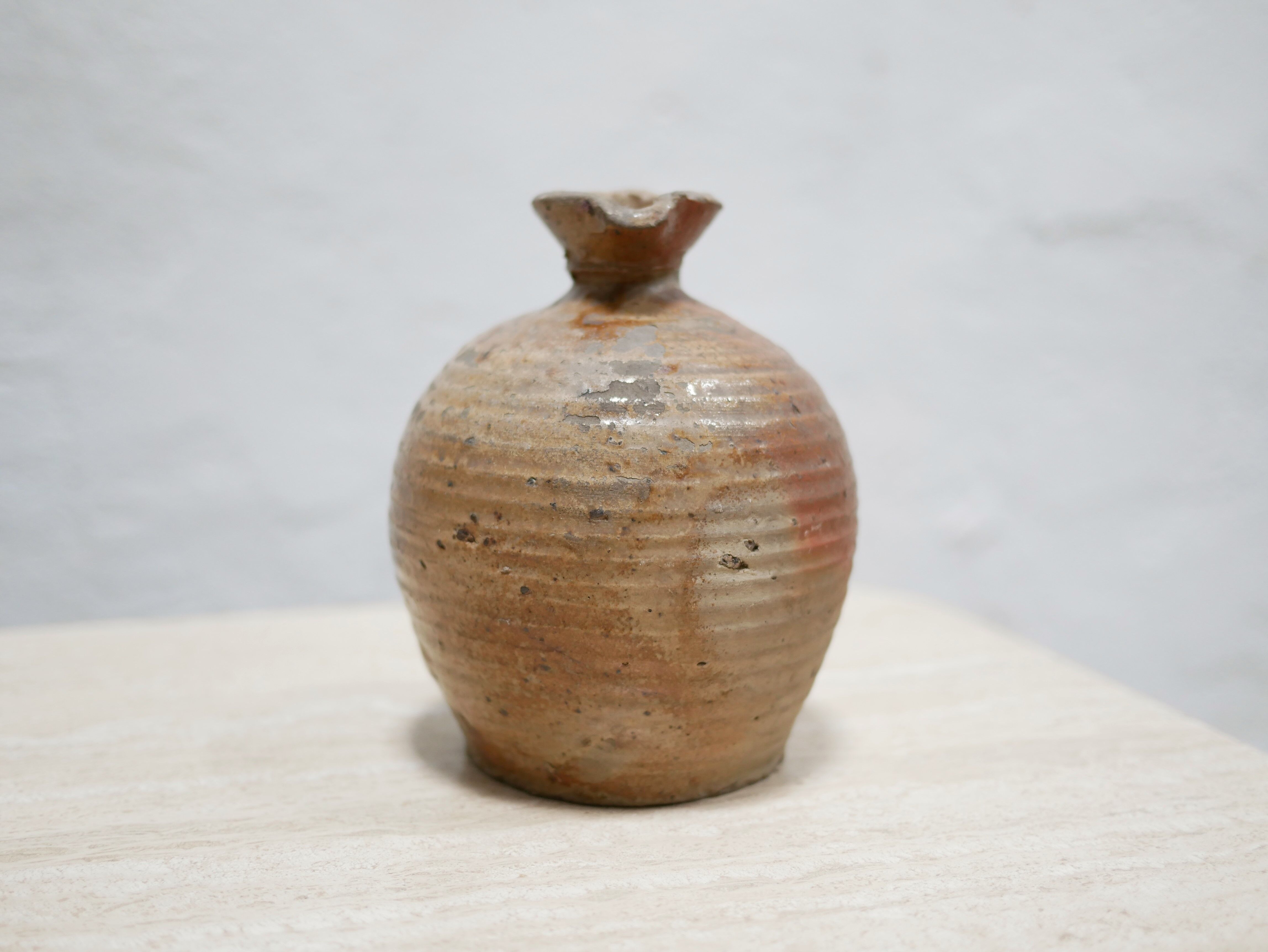 Old glazed terracotta jar