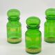 Series of 4 vintage green glass jars, Belgium,