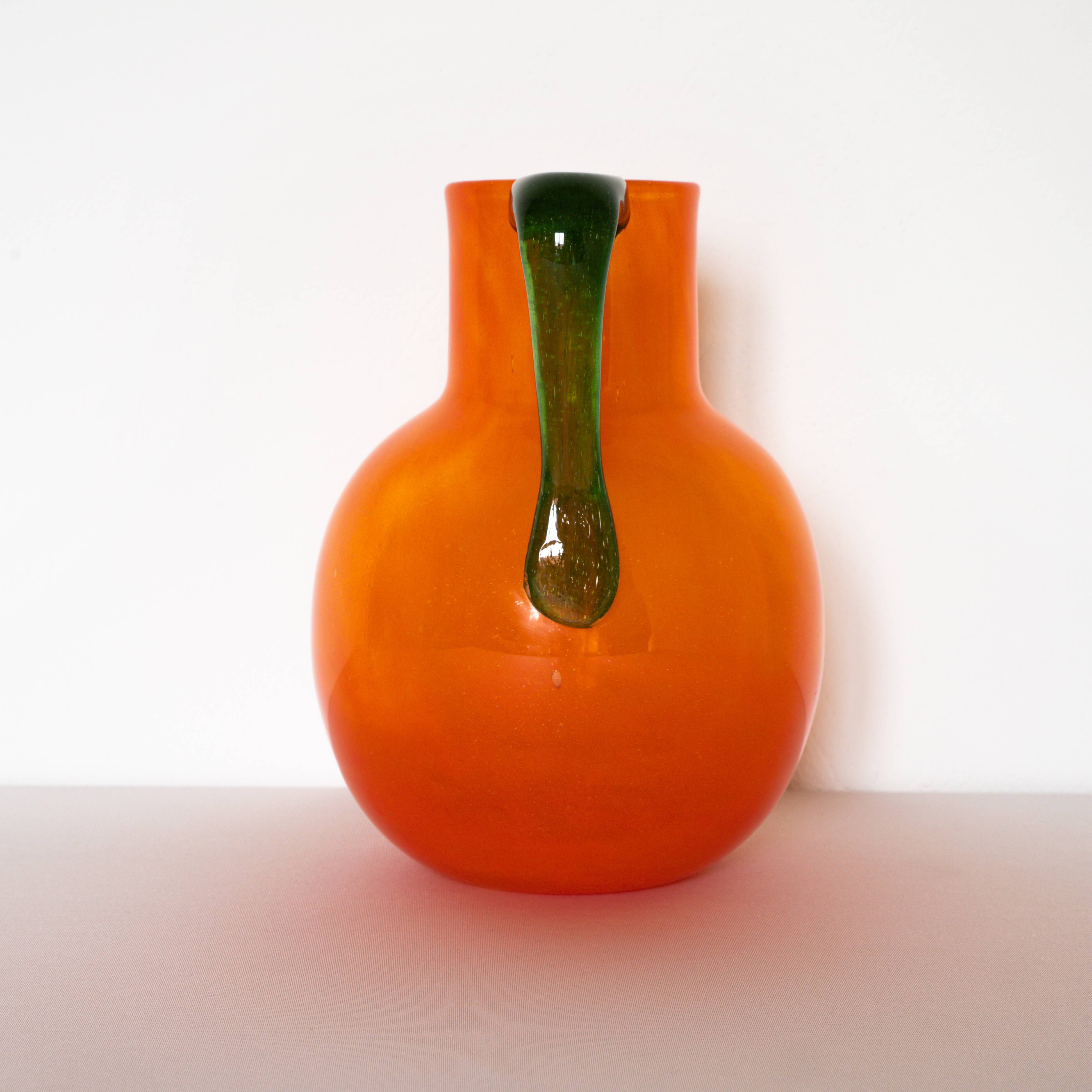 Pitcher in orange and green bubbled glass