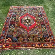 Old Moroccan carpet, made of natural wool and handwoven.