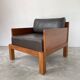 Modernist armchair in exotic wood and leather