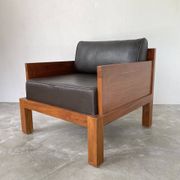 Fauteuil moderniste bois exotique et cuir
