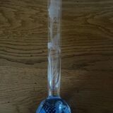Old soliflore vase in bubbled glass and engraved with flowers and foliage