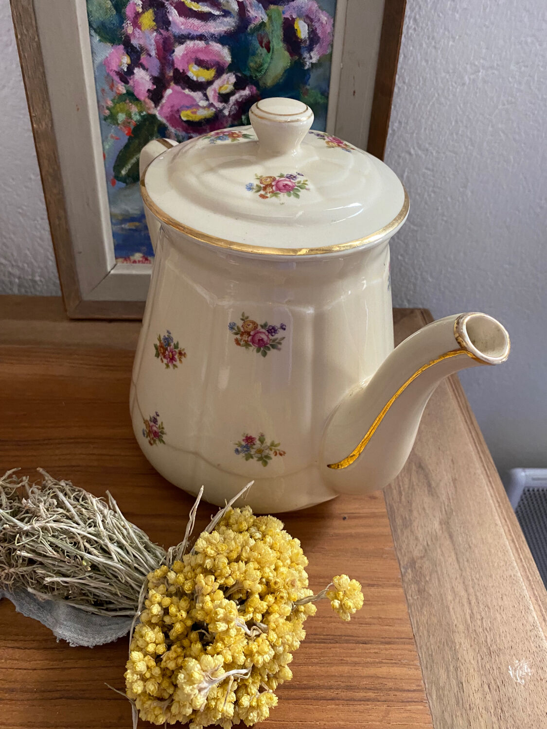 Old teapot or coffee maker in English style.