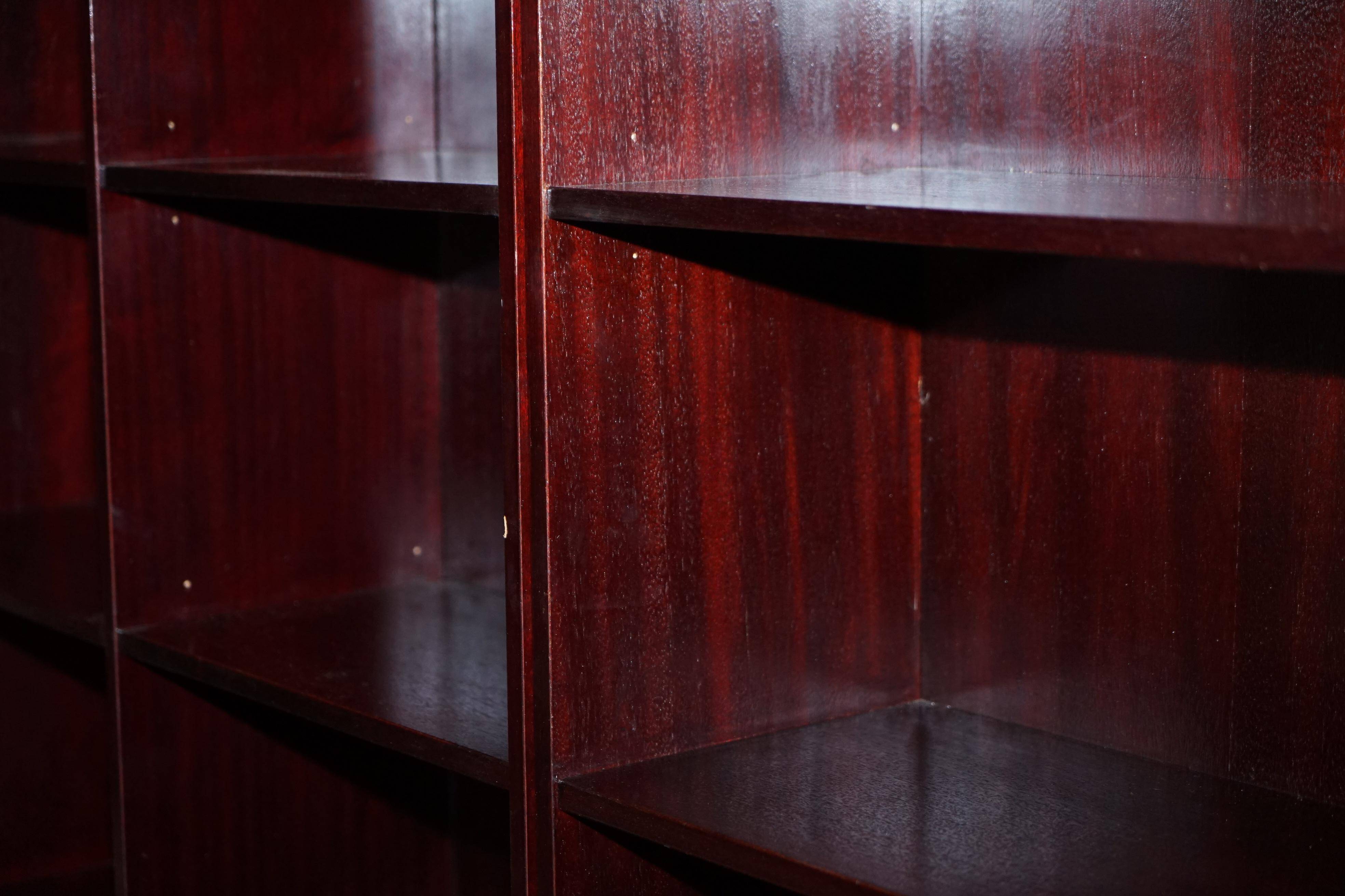 Three vintage style Military Campaign bookshelves, mahogany finish.