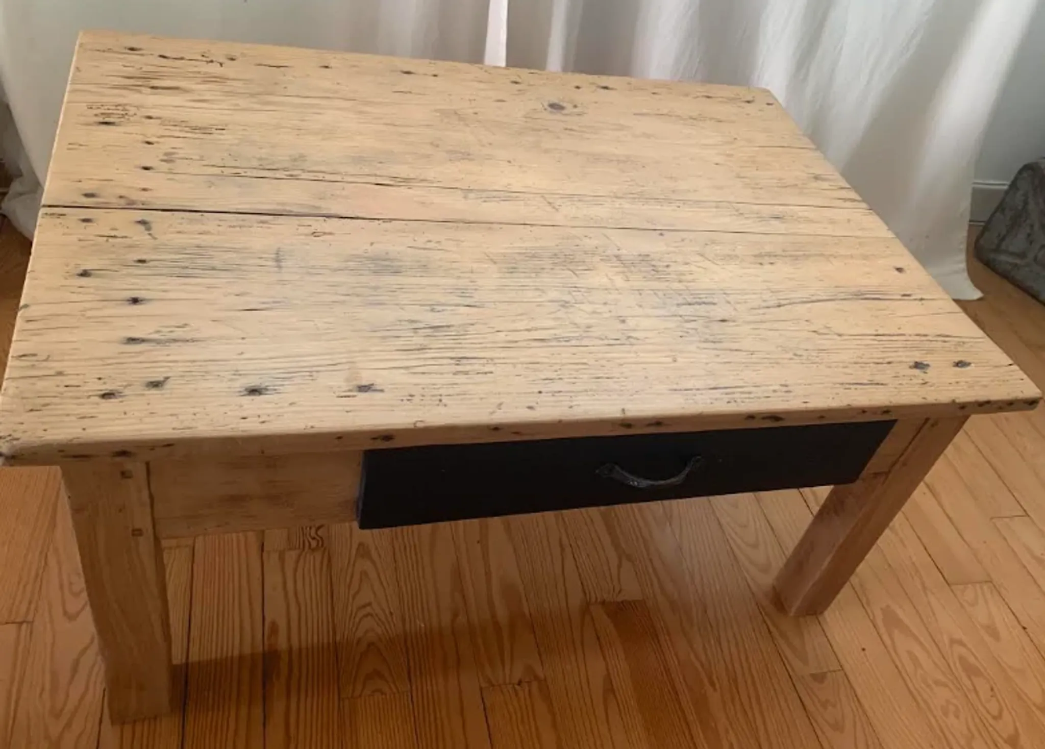 antique wooden coffee table with a patina