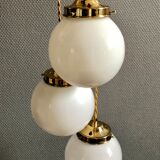Three-light cascade suspension, vintage globes in white opaline