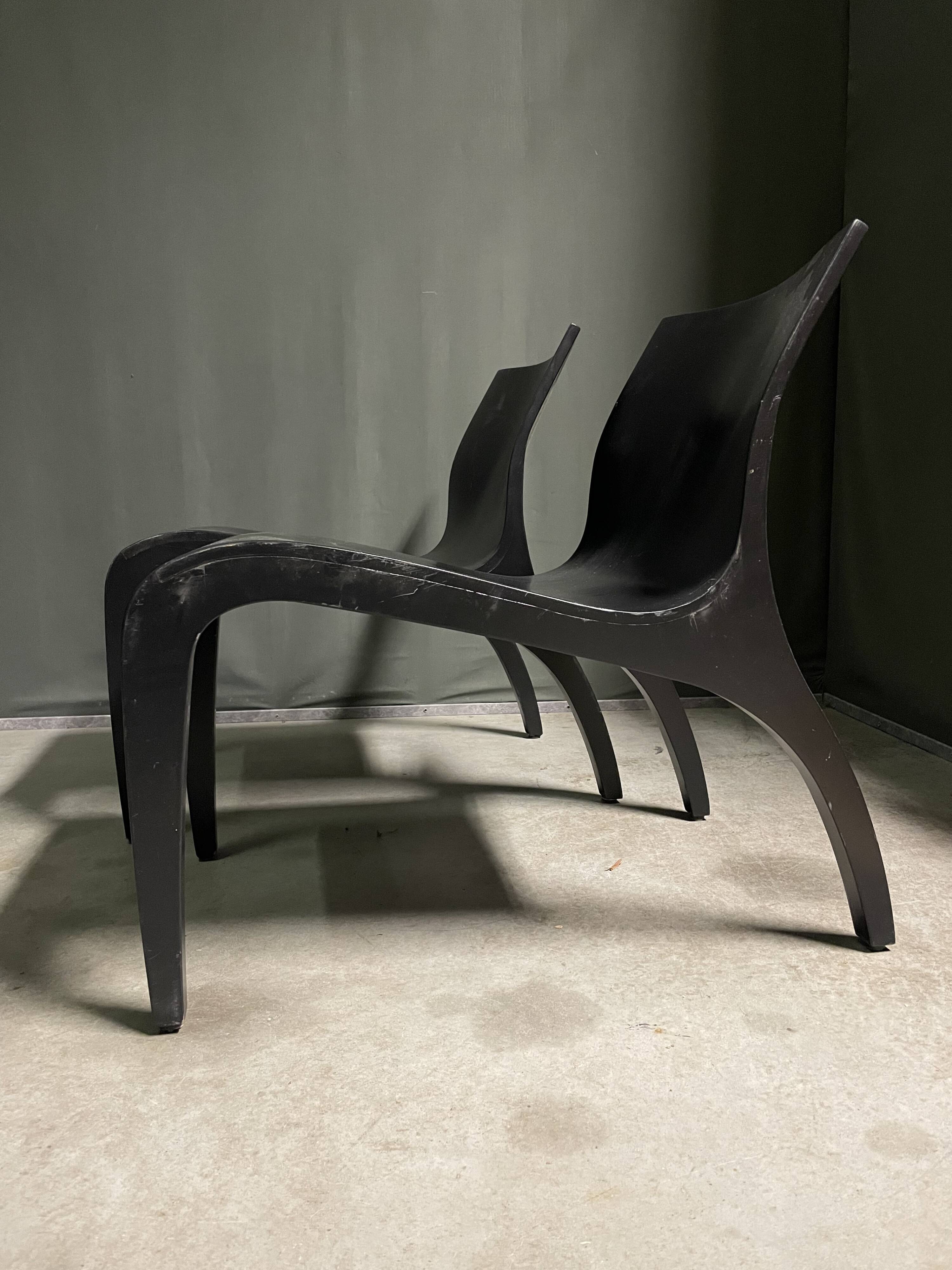 A pair Minimalist bent plywood lounge chairs