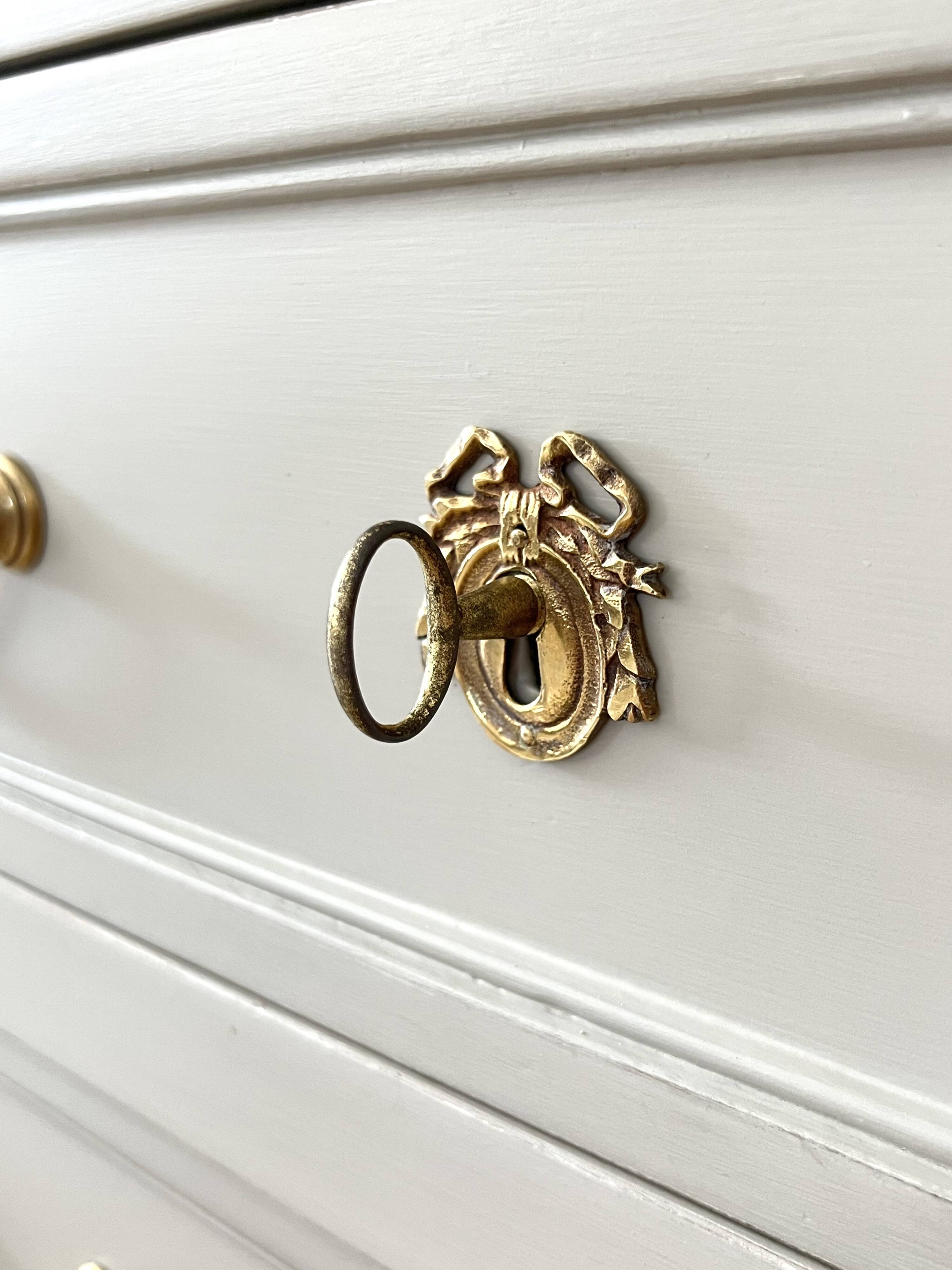 Louis XVI style chest of drawers known as sauteuse
