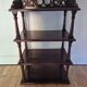 Antique Art Nouveau shelf in carved wood