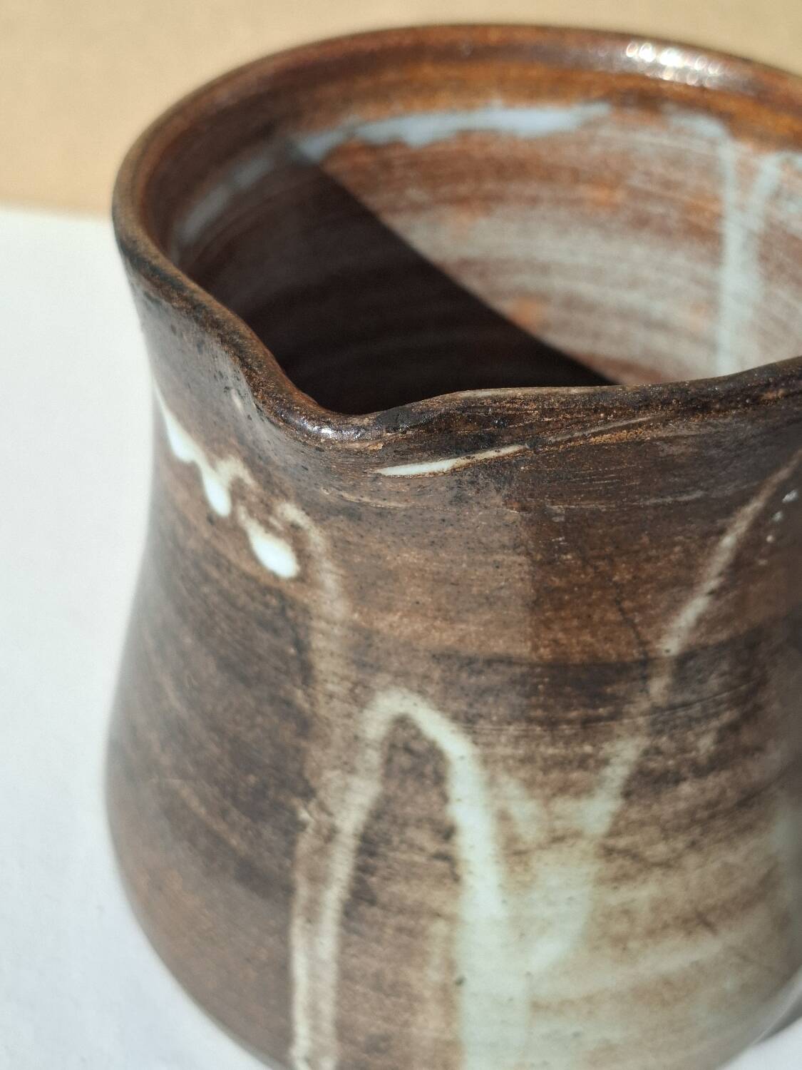 Stoneware pitcher signed by Jacques Pouchain.