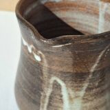 Stoneware pitcher signed by Jacques Pouchain.