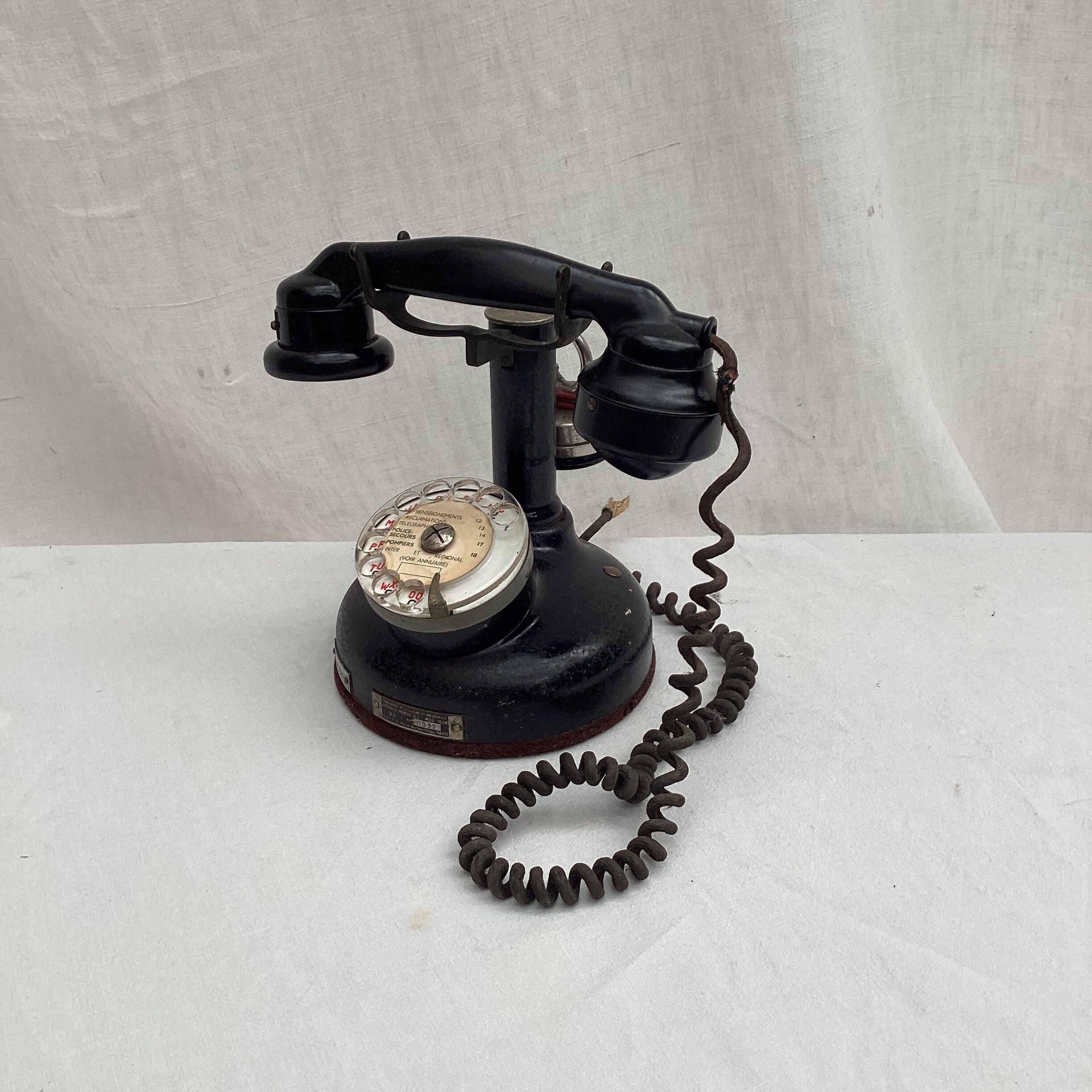 Old phone BCI model 1924 in metal and bakelite