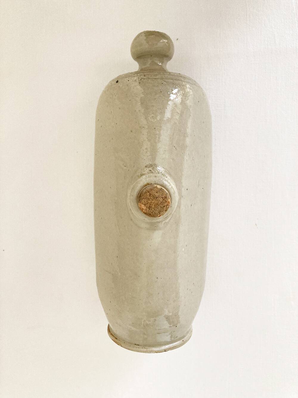 Trio of stoneware hot water bottles, three models